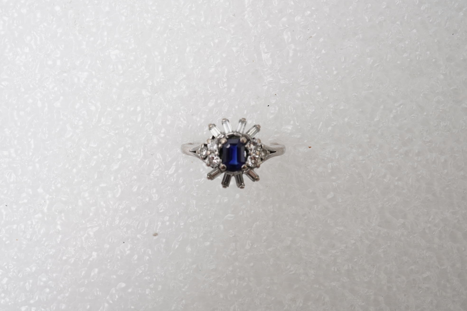 A sapphire and diamond ring, mid 20th century